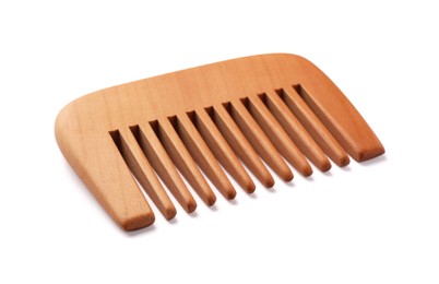 Photo of New wooden hair comb isolated on white