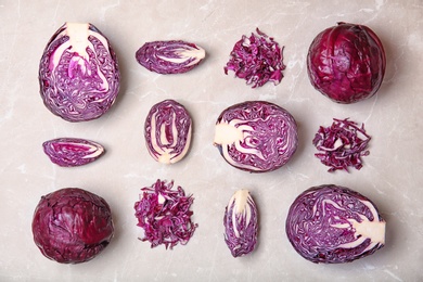 Photo of Flat lay composition with ripe red cabbage on table