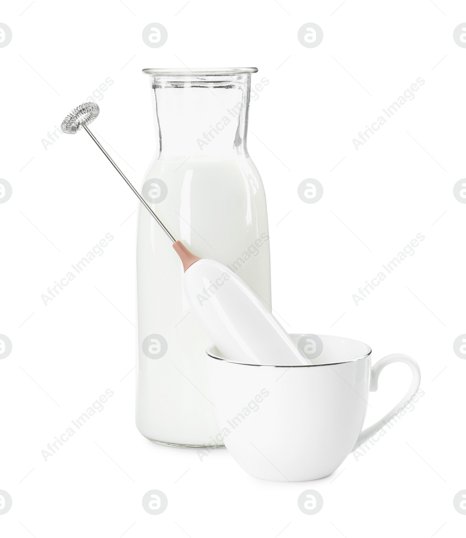 Photo of Milk frother wand, cup and glass carafe isolated on white