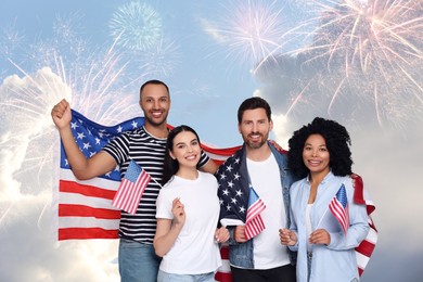 Image of 4th of July - Independence day of America. Happy friends holding national flags of United States against sky with fireworks