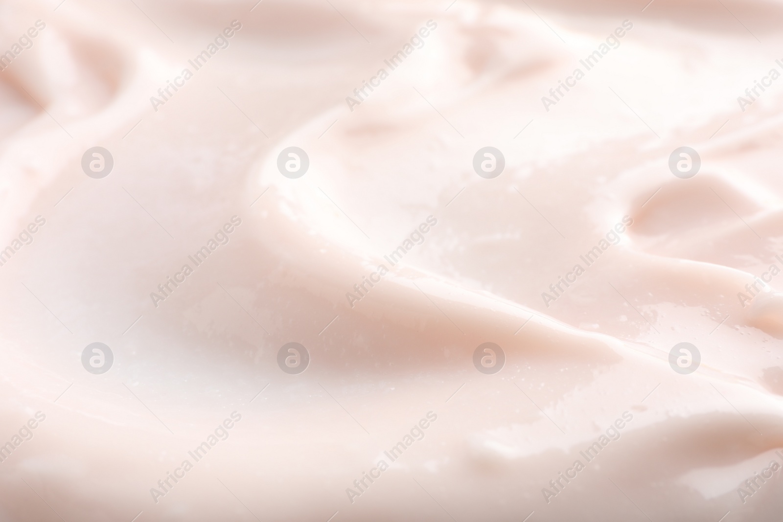 Photo of Texture of face cream as background, closeup view