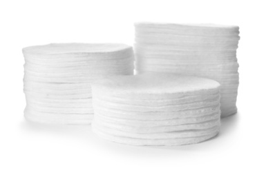 Stacks of cotton pads isolated on white