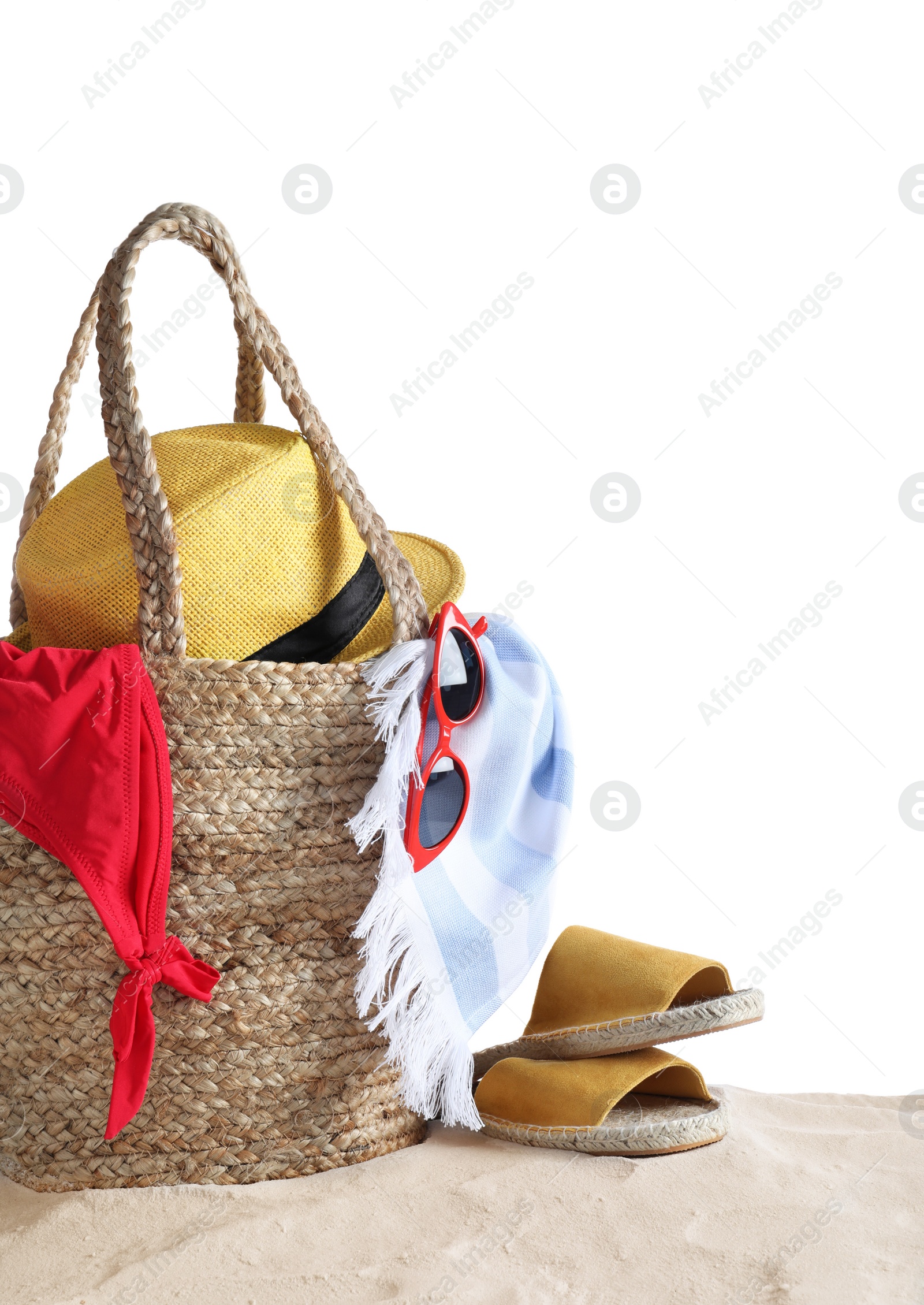 Photo of Composition with beach objects on sand against white background, space for text