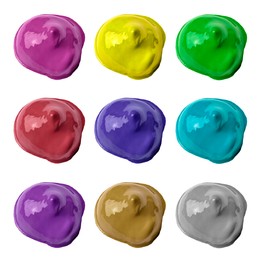 Paint blobs of different colors on white background, top view