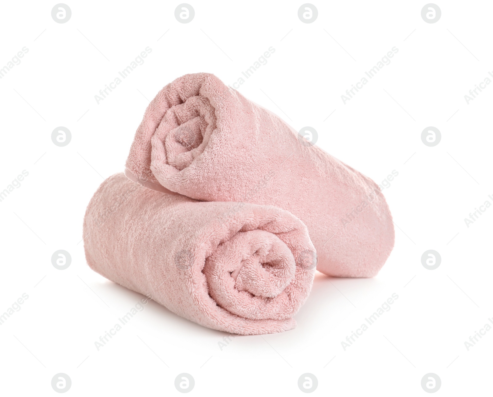 Photo of Rolled soft terry towels on white background