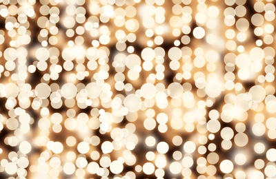 Image of Blurred view of beautiful Christmas lights, bokeh effect