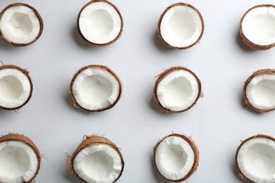 Photo of Coconut pattern on white background, top view