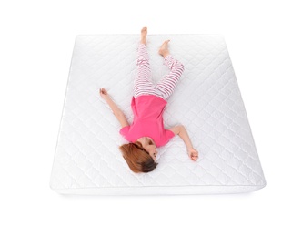 Woman sleeping on mattress against white background, above view