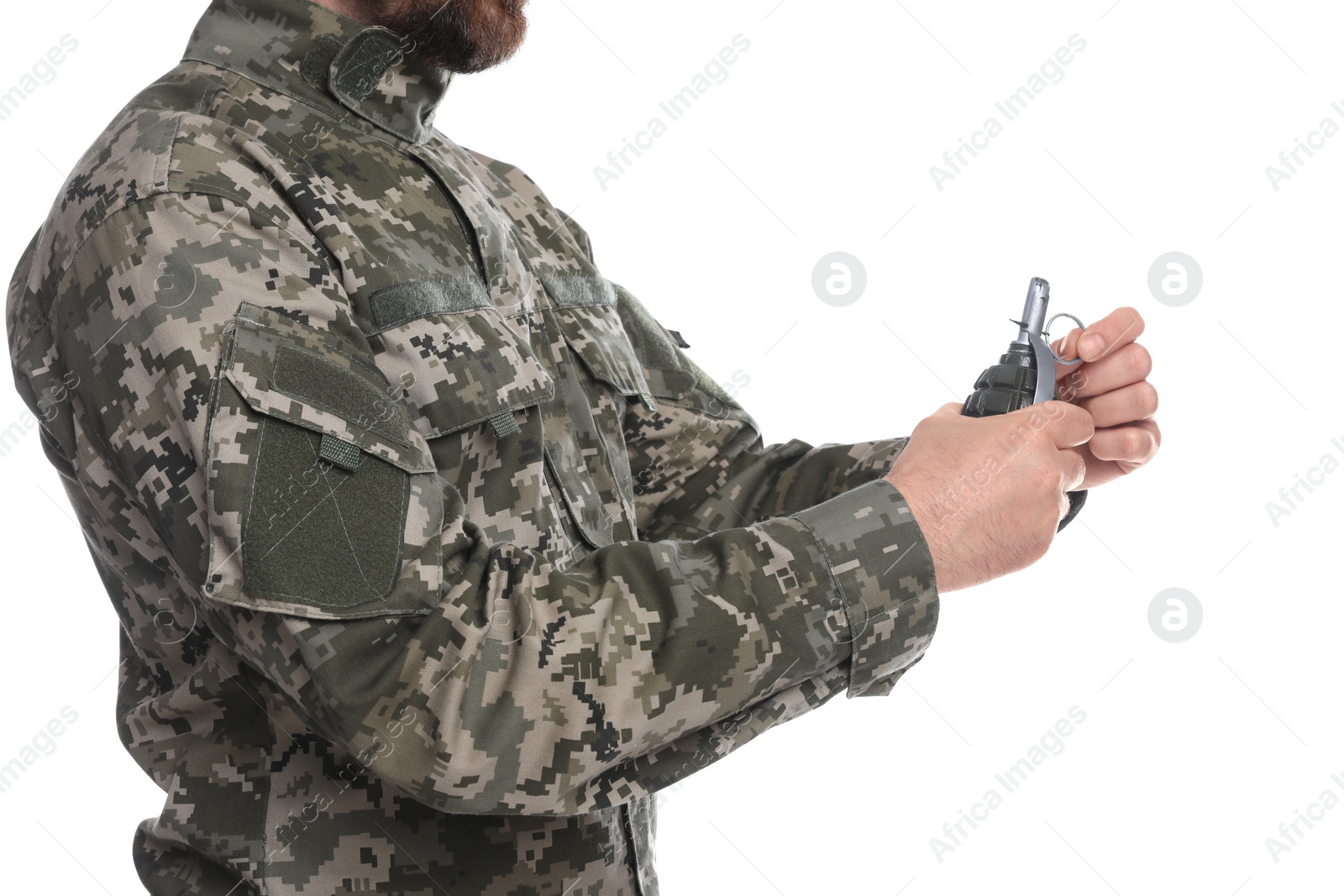 Photo of Soldier pulling safety pin out of hand grenade on white background, closeup. Military service