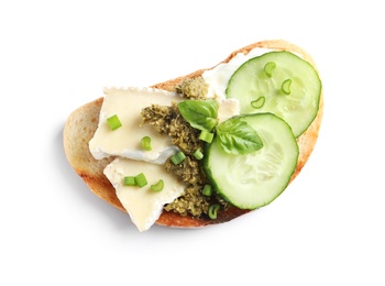 Tasty bruschetta with cucumber and cheese on white background, top view