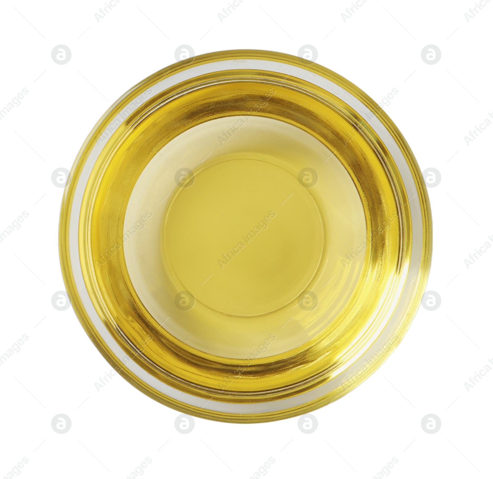 Photo of Glass bowl of cooking oil isolated on white, top view