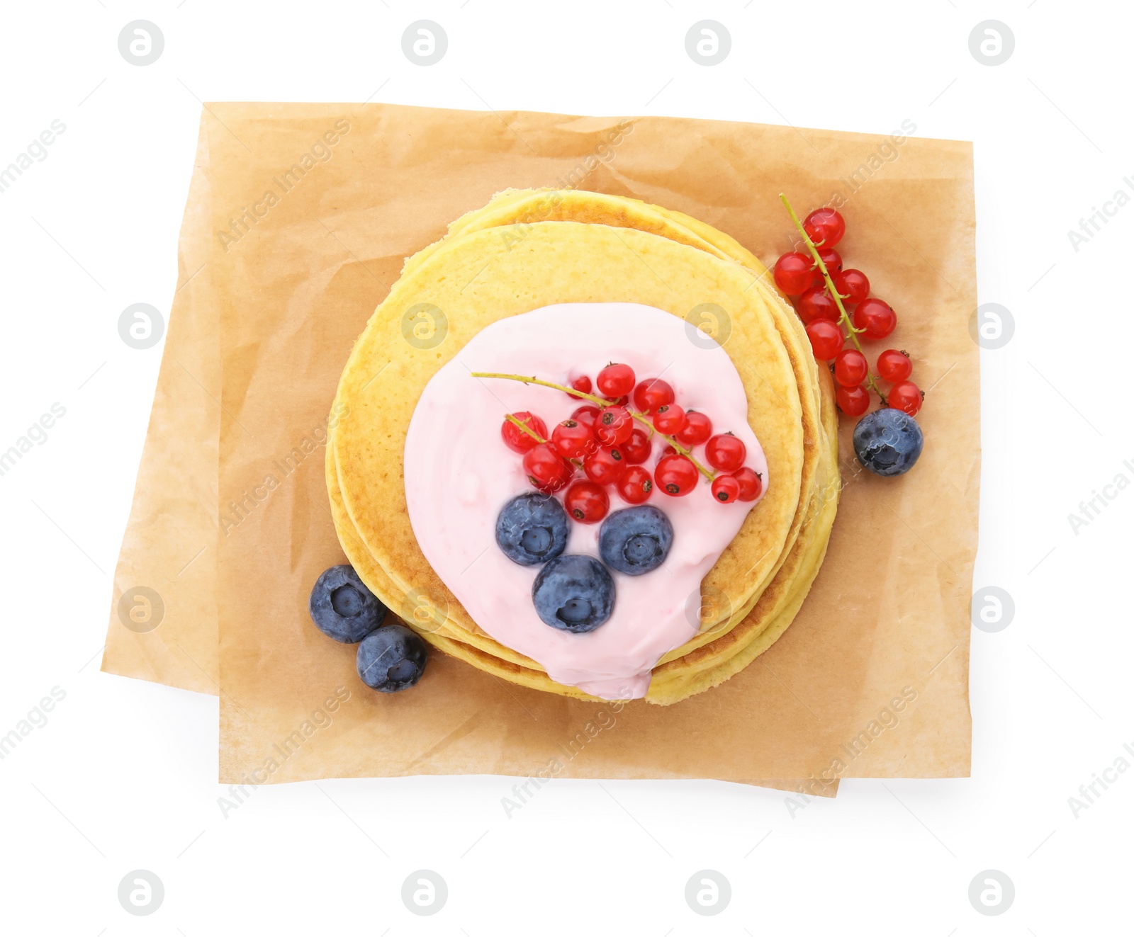 Photo of Tasty pancakes with natural yogurt, blueberries and red currants on white background