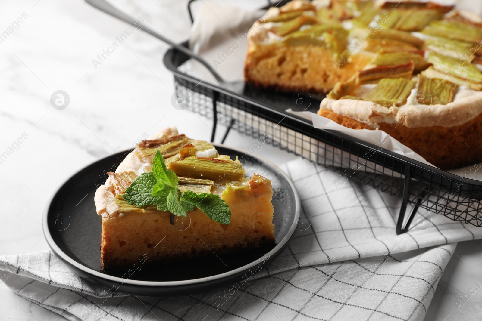 Photo of Freshly baked rhubarb pie on white marble table