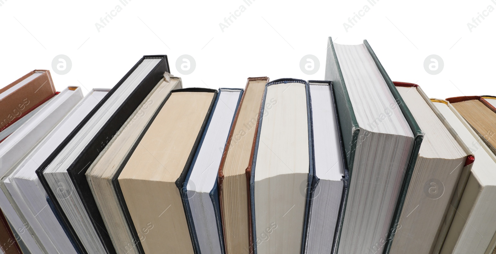 Photo of Many different hardcover books isolated on white