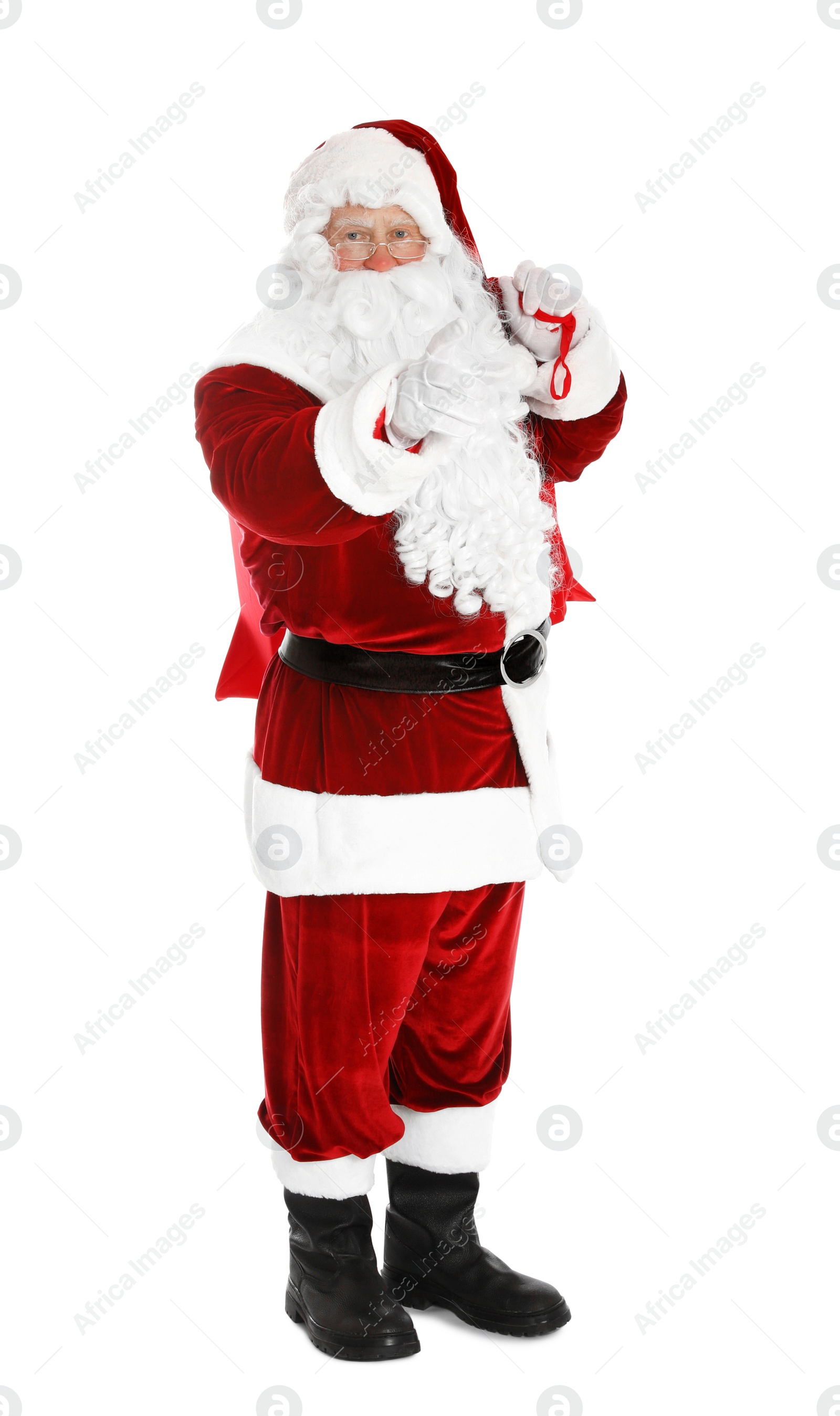 Photo of Authentic Santa Claus with bag full of gifts on white background