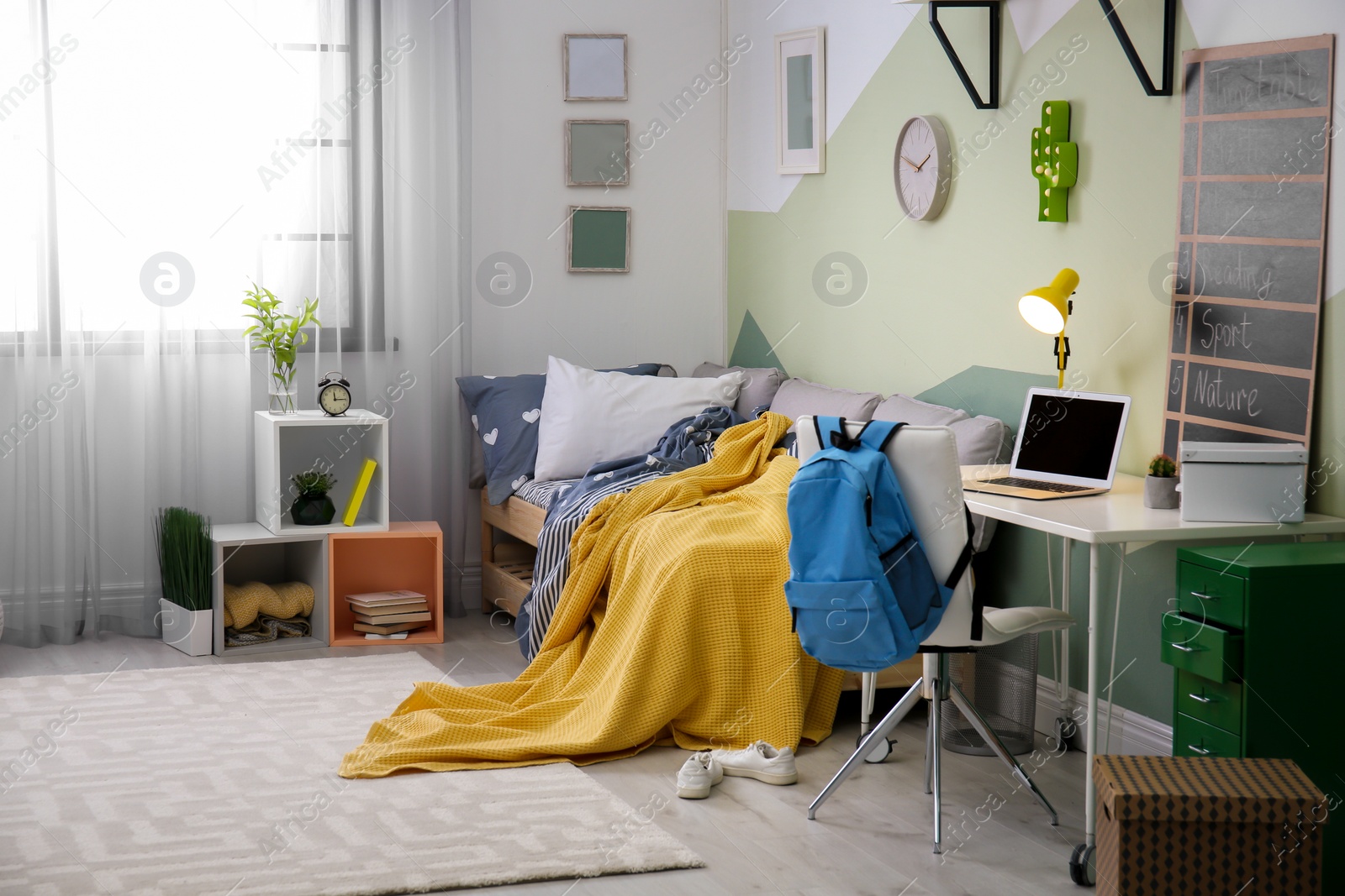 Photo of Modern child room interior with comfortable bed