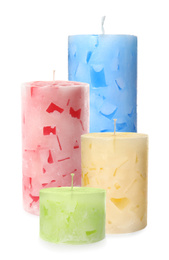 Set of color wax candles on white background