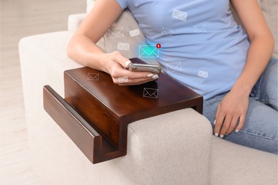 Image of Email. Woman using mobile phone at home, closeup. Letter illustrations around device