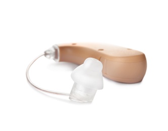 Photo of Hearing aid on white background. Medical device