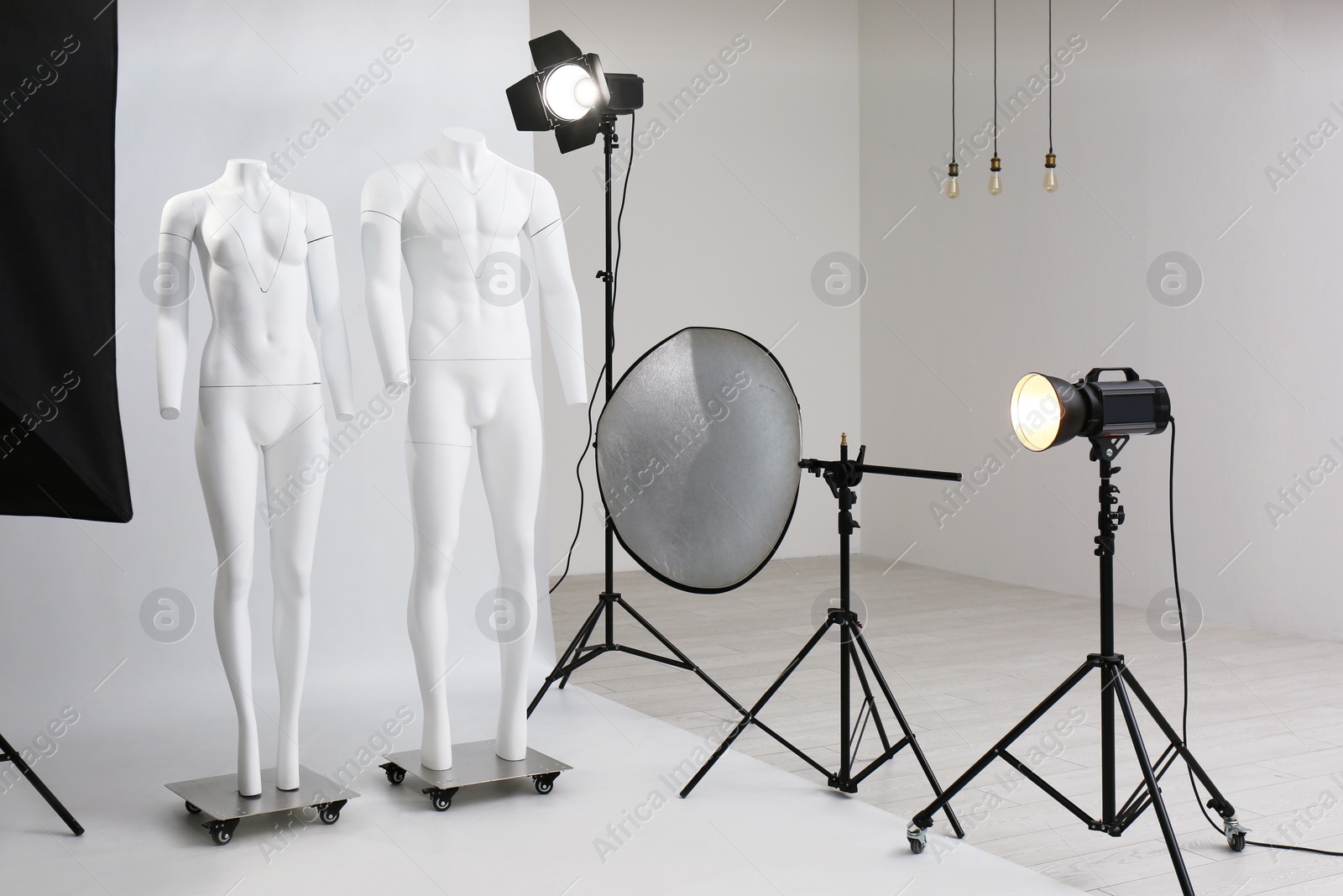 Photo of Modern ghost mannequins in professional photo studio