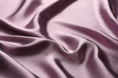 Photo of Texture of beautiful silk fabric as background, closeup