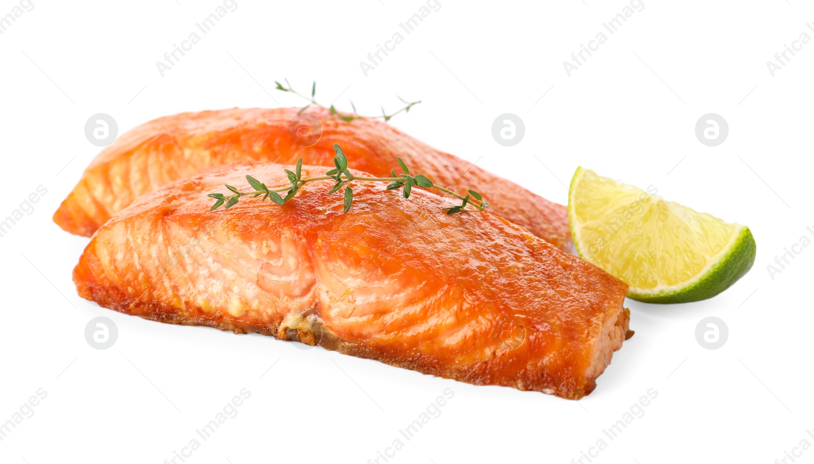 Photo of Delicious roasted fish with thyme and lime isolated on white