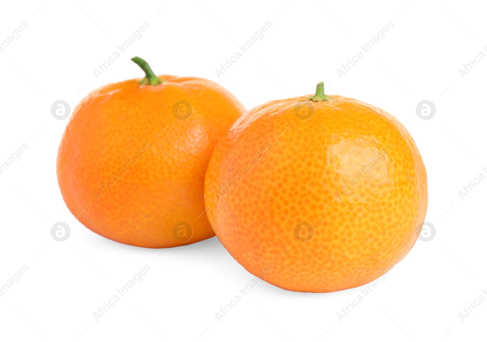 Photo of Fresh ripe juicy tangerines isolated on white