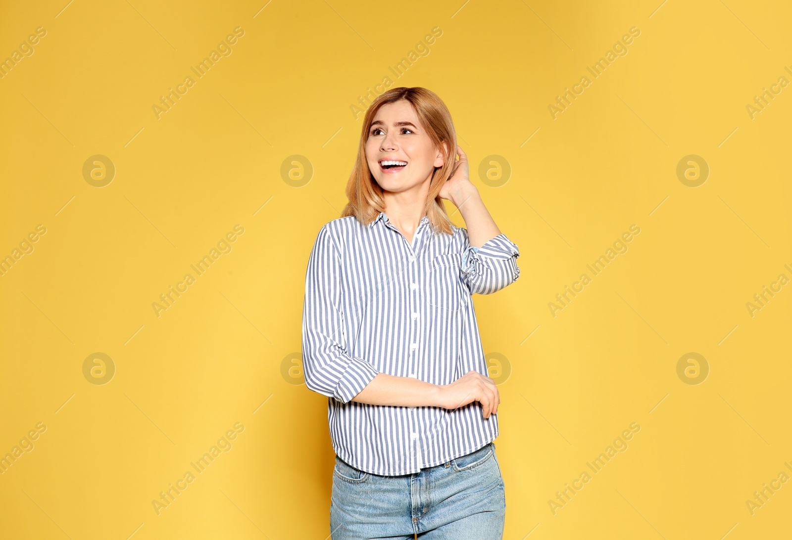 Photo of Portrait of emotional woman posing on color background