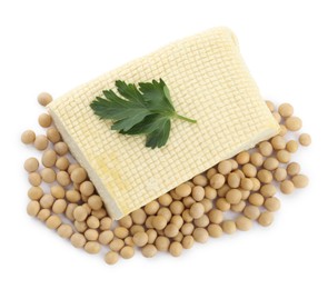 Photo of Piece of delicious tofu with parsley and soy on white background, top view