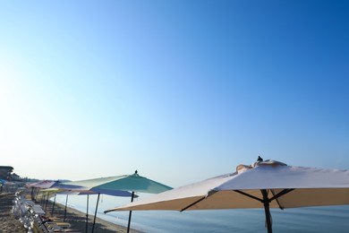 Many beach umbrellas and sunbeds at resort