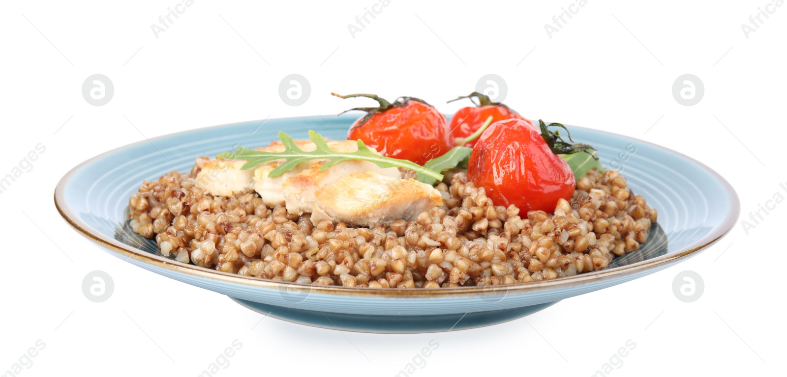 Photo of Delicious buckwheat porridge with meat and tomatoes on white background