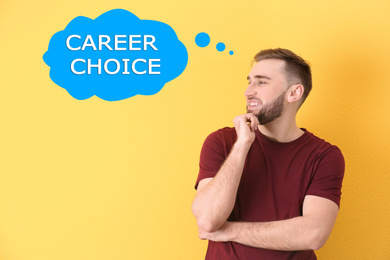 Image of Man thinking about career choice on yellow background
