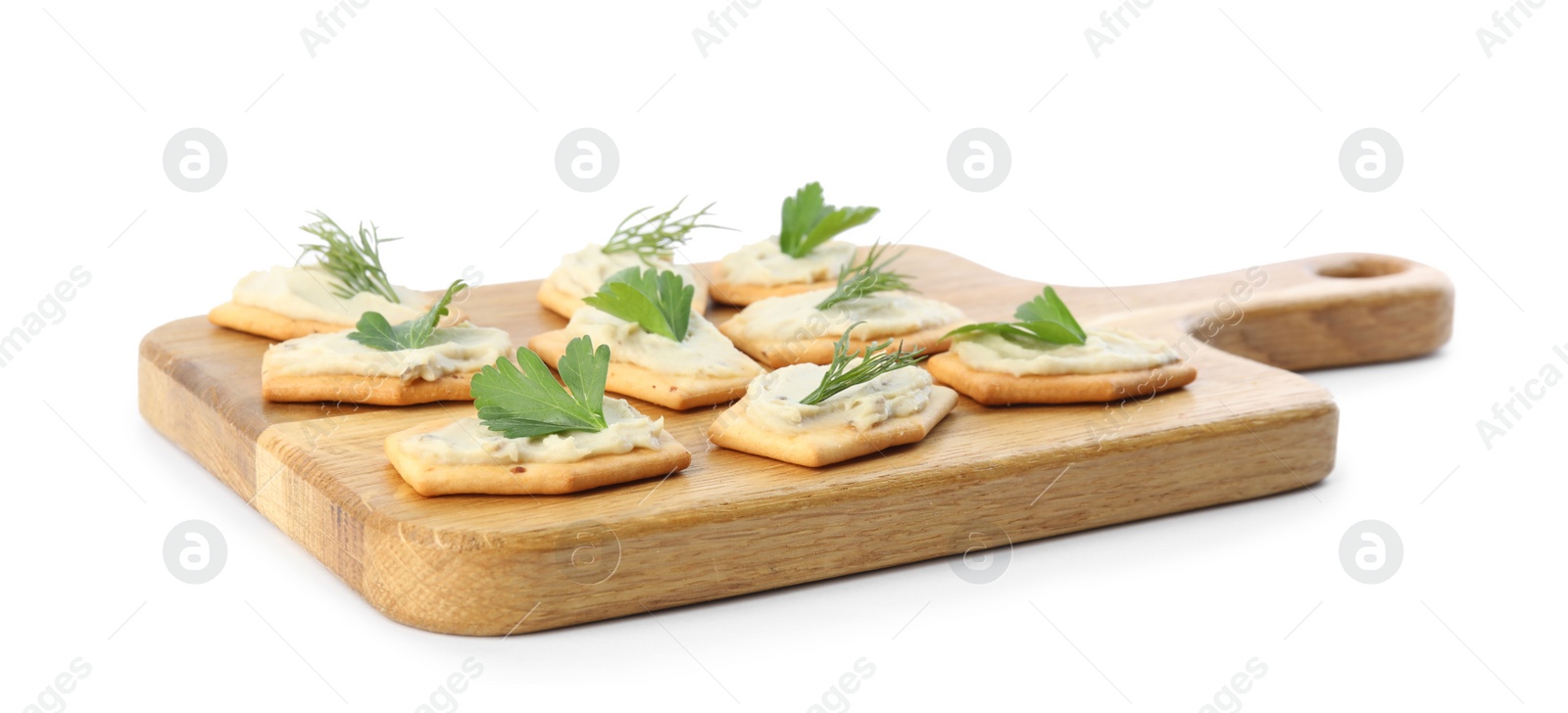 Photo of Delicious crackers with humus, parsley and dill on white background