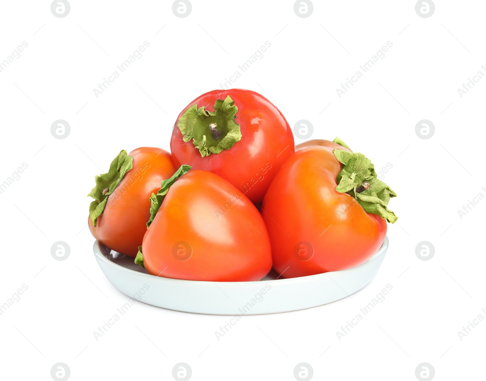 Photo of Plate with delicious fresh persimmons isolated on white