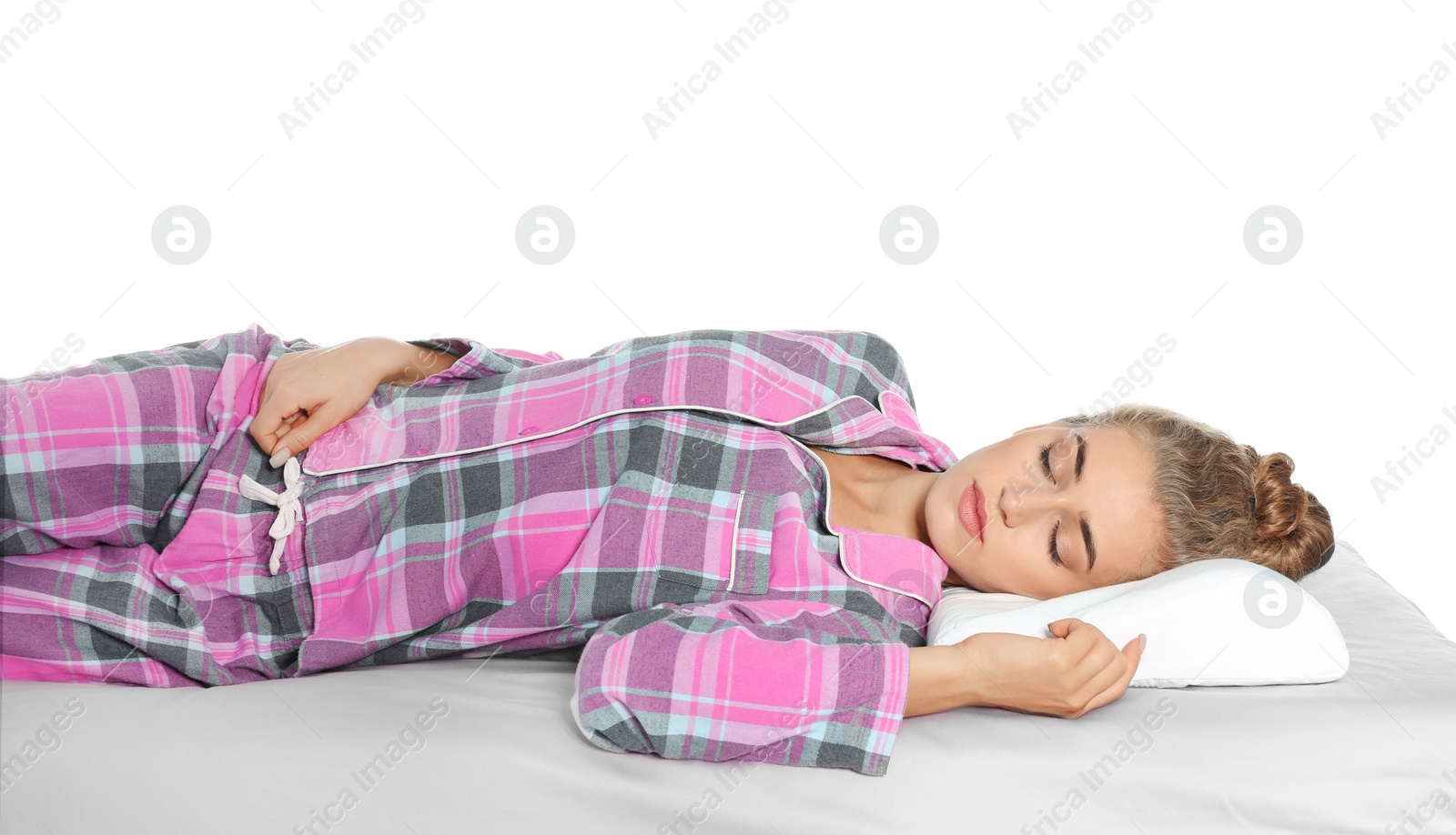 Photo of Beautiful woman sleeping with orthopedic pillow on bed against white background