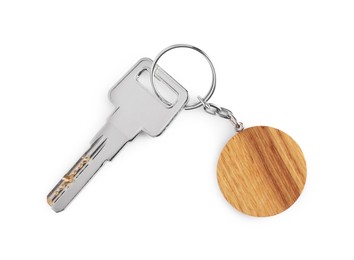 Photo of Key with wooden keychain isolated on white, top view