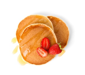 Tasty pancakes with maple syrup and fresh berries on white background, top view