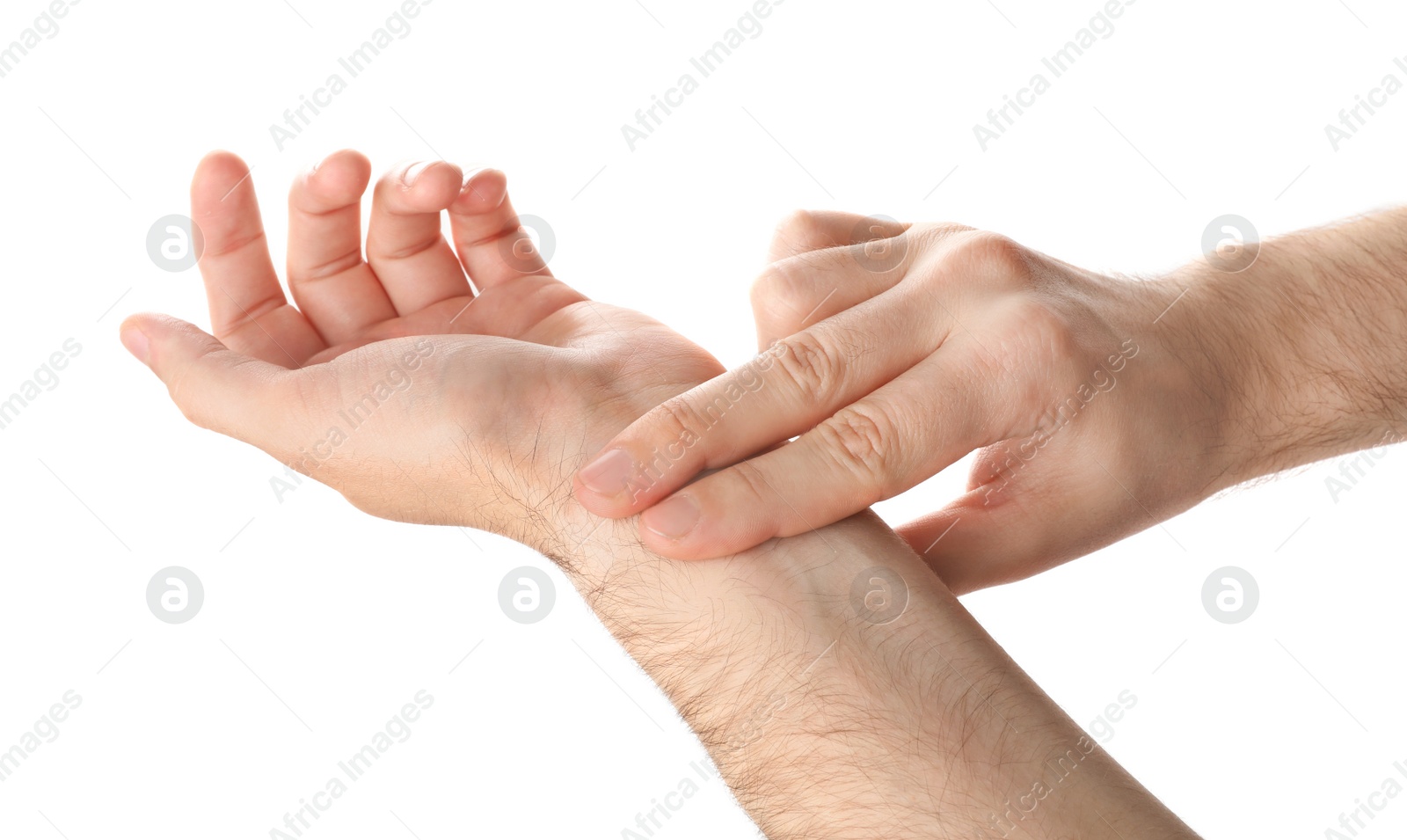 Photo of Man checking pulse on wrist against white background, closeup