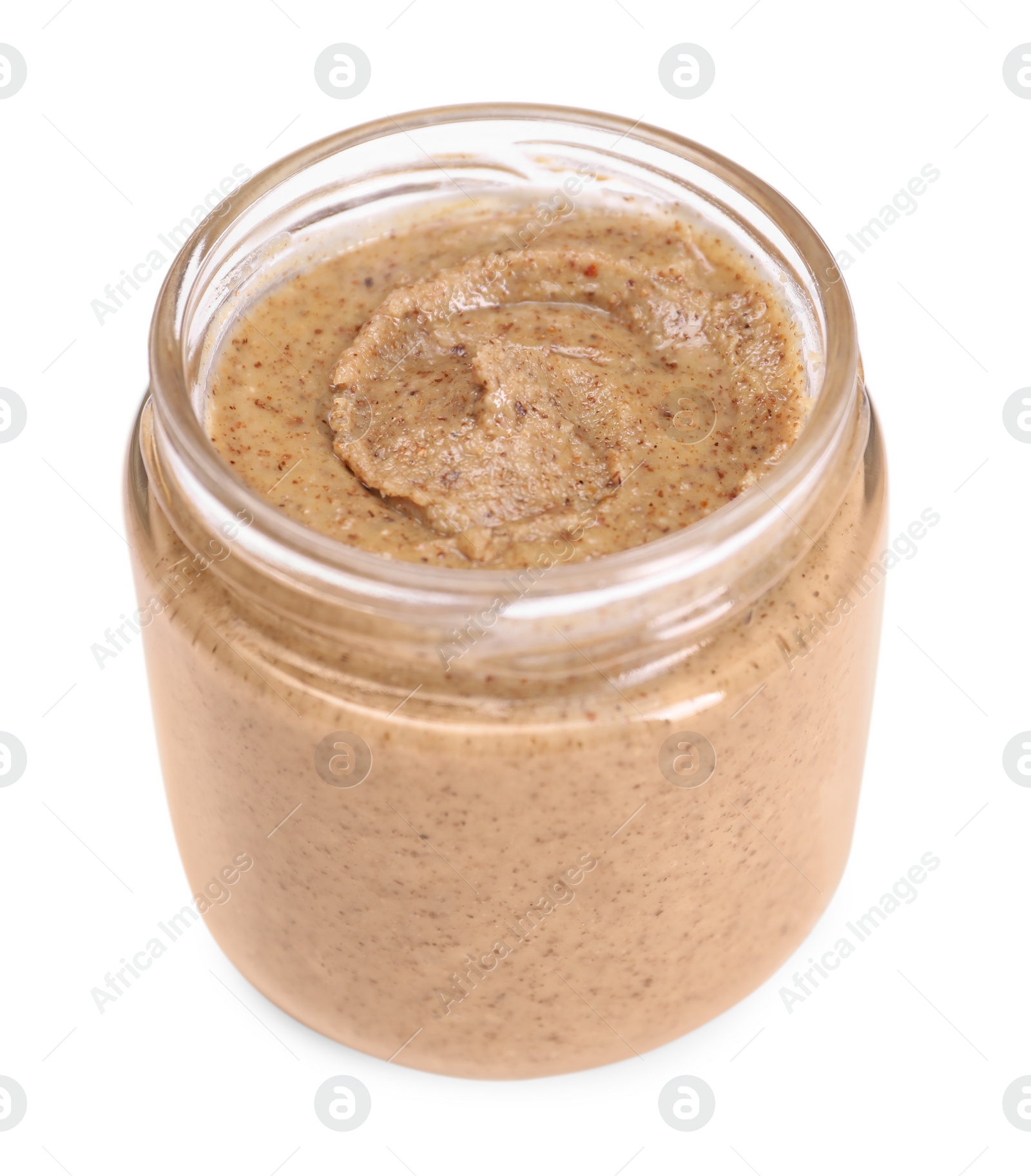 Photo of Tasty nut paste in jar isolated on white