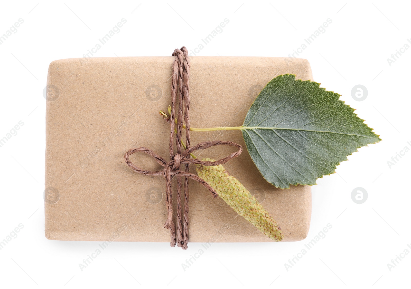 Photo of Natural tar soap bar isolated on white, top view