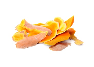 Photo of Pumpkin peel on white background. Composting of organic waste