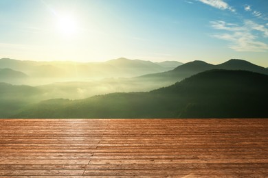 Image of Empty wooden surface and beautiful view of mountain landscape