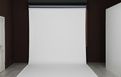 Photo of Empty white photo background. Professional studio equipment