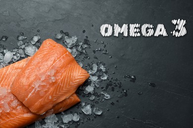 Omega 3. Fresh cut salmon and ice on black table, top view