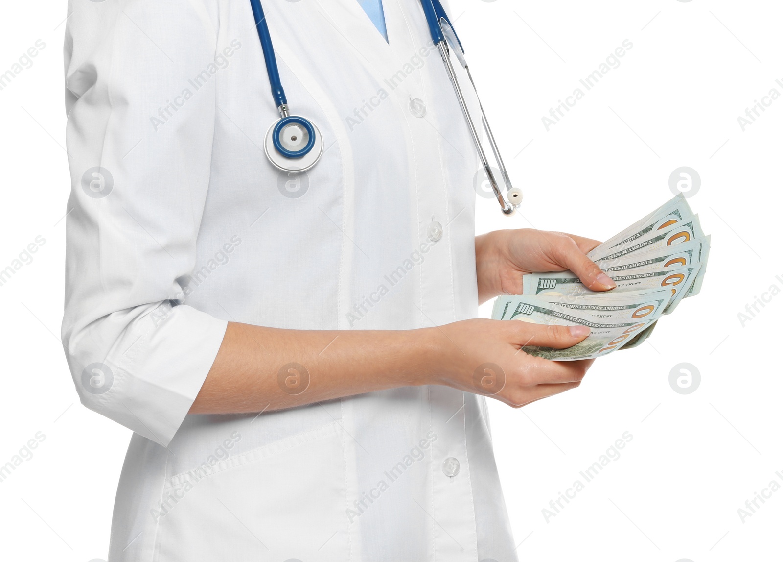 Photo of Doctor with bribe on white background, closeup. Corruption in medicine