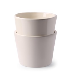 Photo of Empty ceramic flower pots on white background