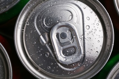 Photo of Energy drink in wet can, top view. Functional beverage