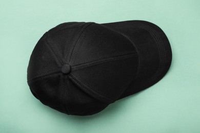 Photo of Baseball cap on light background, top view. Mock up for design