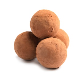 Delicious raw chocolate truffles on white background