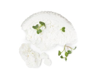 Fresh cottage cheese with microgreens isolated on white, top view